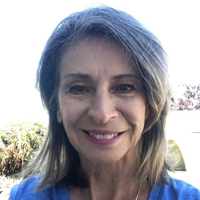 Head shot of Liz Weber, wearing a blue shirt.